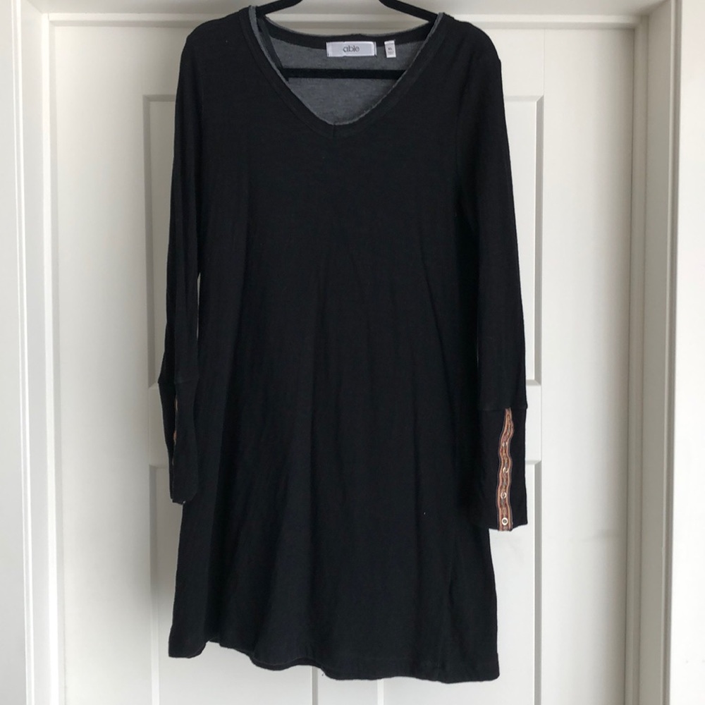 Knit long shirt. Goes great with leggings.
